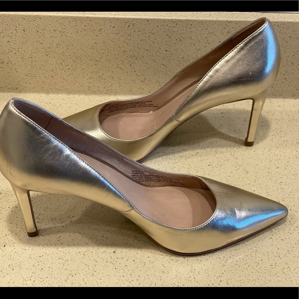 Pumps NWOT. Pure Navy.  Gold leather 3 high heels